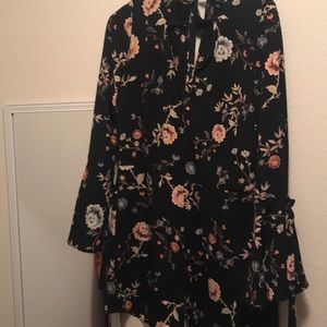 Floral romper with bell sleeves
